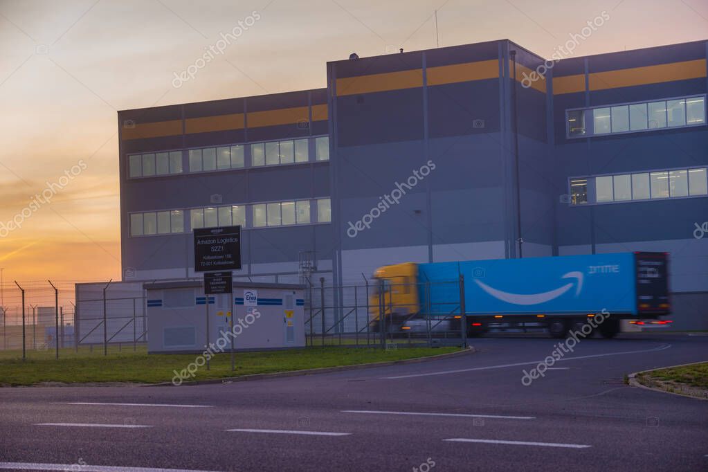 Truck trailer with Logo Amazon Prime entering the Amazon logistics center