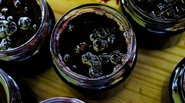 Process Filling Homemade Chokeberry Jam Tray Banner Jars Full Aronia — Stock Photo, Image