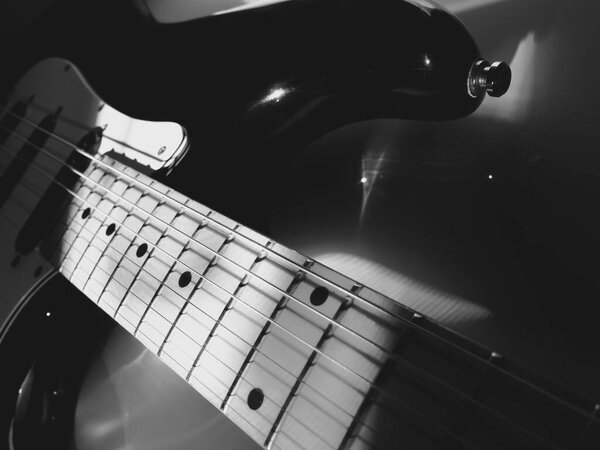 Electric guitar . dark background / copy space