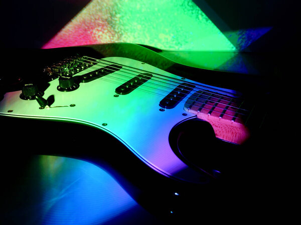 electric guitar closeup in the stage light