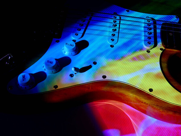 electric guitar in the stage light . Copy space 