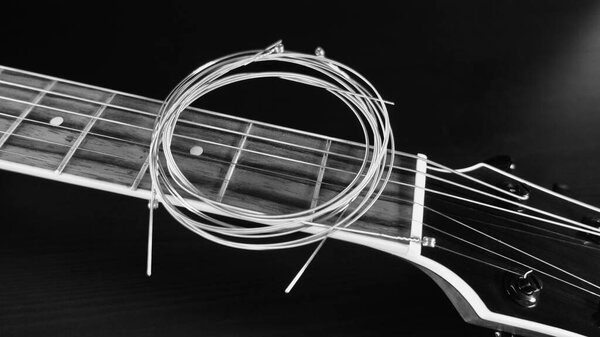 Guitar and strings closeup . copy space