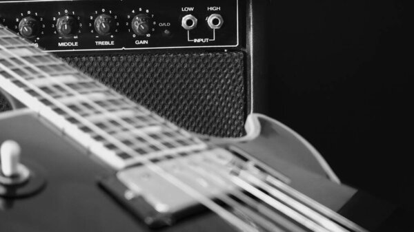 Electric guitar and guitar combo . amplifier closeup