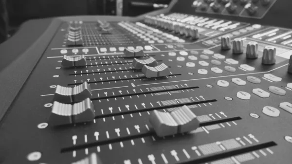 sound mixing console closeup . Black and white