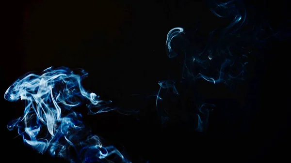 Rök Ljusstrålarna Drar Vackra Bilder — Stockfoto