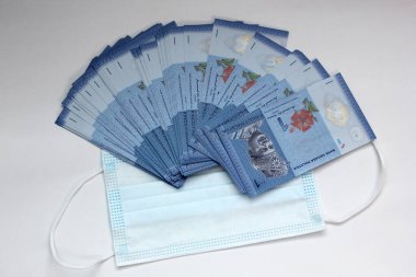 Yüz maskeleri, Malezya 'daki yeni dünya para birimi. Corona Covid-19 krizi yüz maskelerini en çok arzu edilen ve en değerli ekipman haline getirdi..