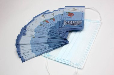 Yüz maskeleri, Malezya 'daki yeni dünya para birimi. Corona Covid-19 krizi yüz maskelerini en çok arzu edilen ve en değerli ekipman haline getirdi..