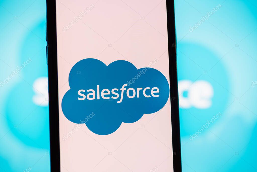 Smartphone with salesforce logo on the screen. High quality photo.