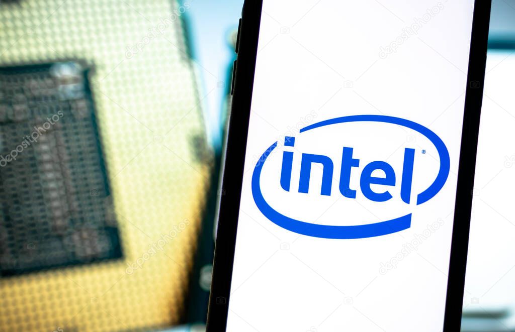 Intel logo on smartphone screen. . High quality photo.