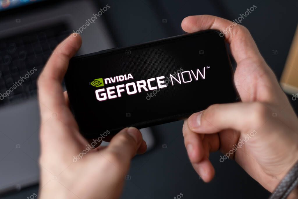 Geforce Now logo on smartphone screen. High quality photo.