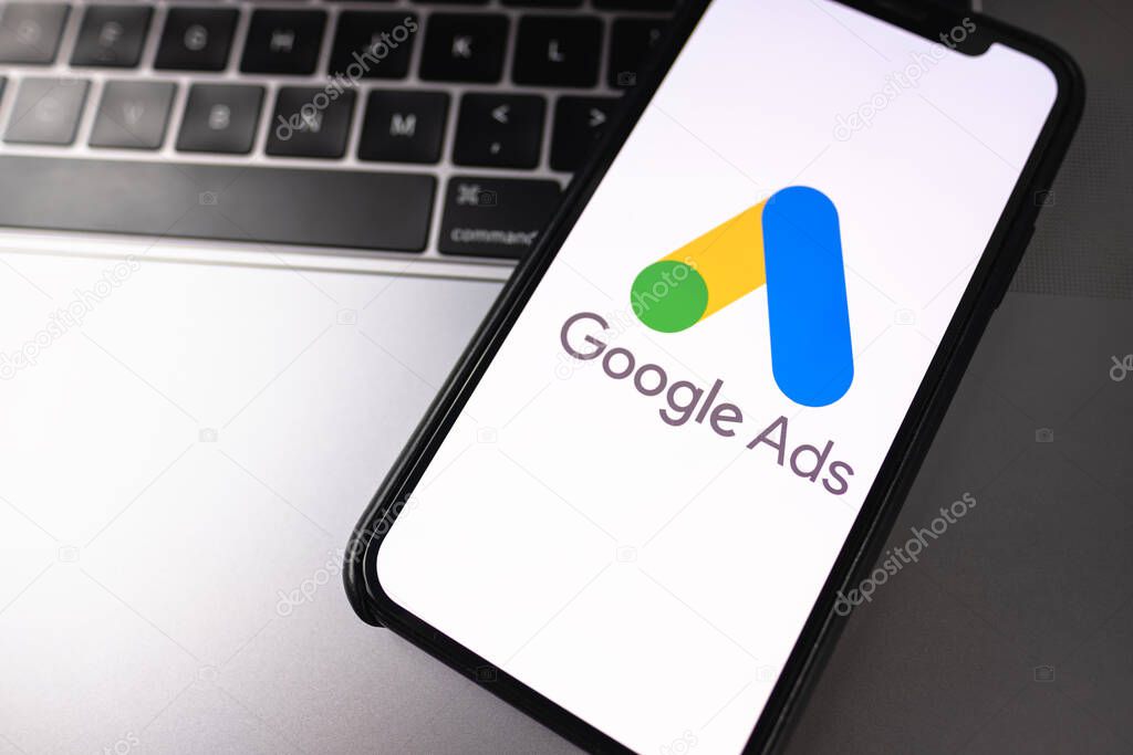 Google Ads logo on smartphone screen. High quality photo.
