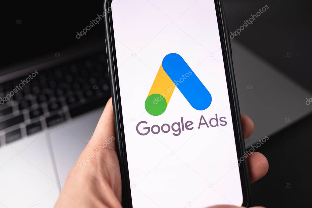 Google Ads logo on smartphone screen. High quality photo.
