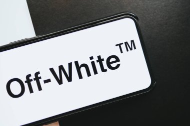 iPhone with off-white brand logo on the screen. clipart