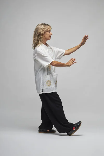 Mature Blonde Woman Practicing Chi Kung Tai Chi White Background — Stock Photo, Image
