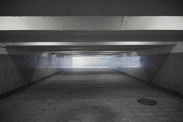 Long gray underground pedestrian passage