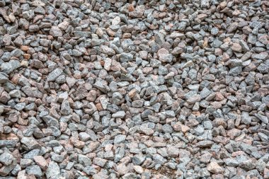 İnşaat çakıl ve çakıl yığınının gri desenli yüzeyi
