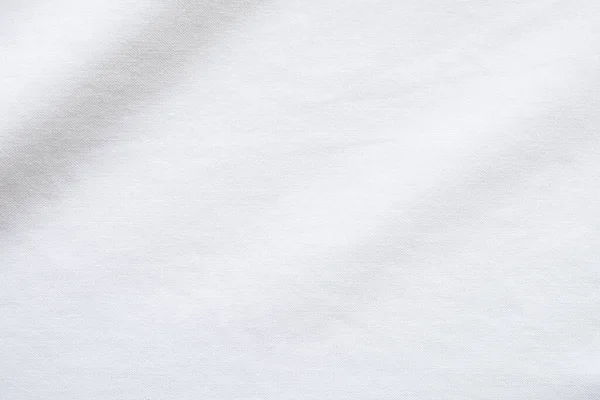 顶部视图近距离拍摄的白色面料棉衬衫与编织渐变细节 背景和墙纸概念 — 图库照片