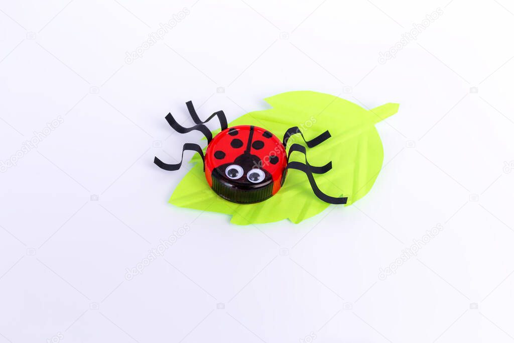 simple ladybug craft for kids, bottle cap crafts for kids