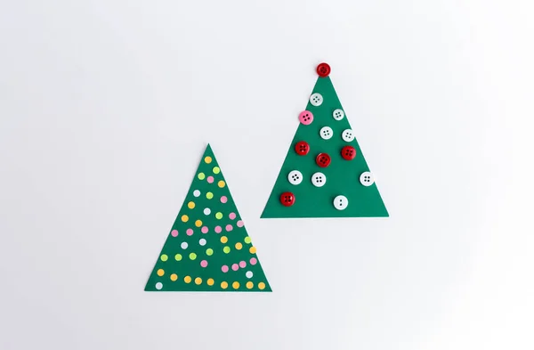 Two paper Christmas tree crafts — Stock Photo, Image
