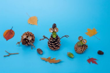 Çocuklar için çam kozalağı sanatı