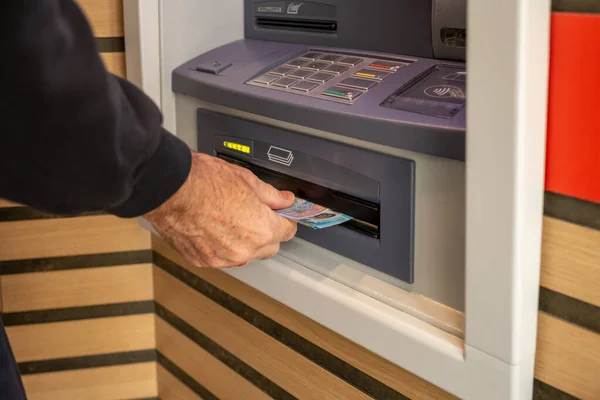 money at ATM, cash machine