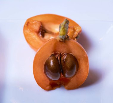 Medlar, ikiye bölündü, turuncu, beyaz, doğal, ekolojik, makro fotoğrafçılık