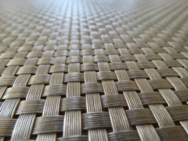 Soyut dokusal kahverengi arka plan üniformalı hasır yüzey. Yüksek kalite fotoğraf