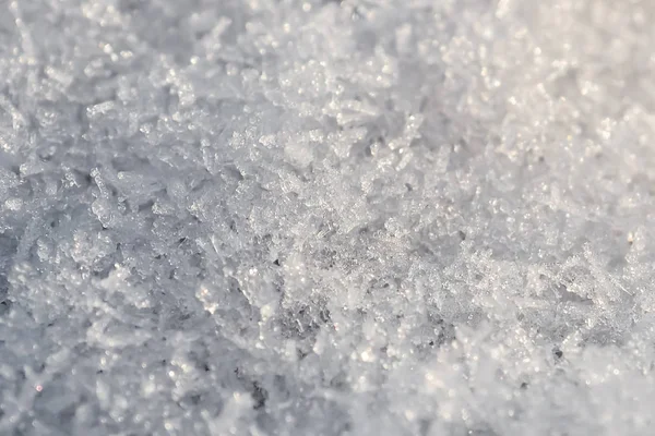 Achtergrond van de sneeuw kristal. — Stockfoto