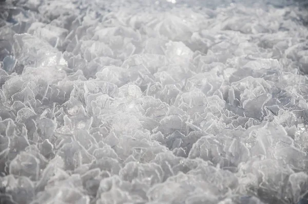 Wasser gefroren in Eis Makro Hintergrund fester Kristalle. — Stockfoto