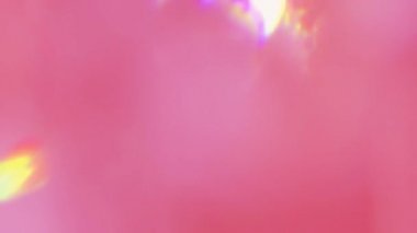 Bokeh sızıntıları çok renkli kırmızı renklerdir. Çemberler hareket halinde bulanık.