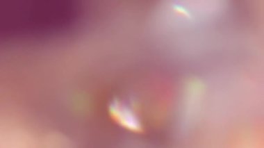 Bokeh sızıntıları çok renkli kırmızı renklerdir. Çemberler hareket halinde bulanık.