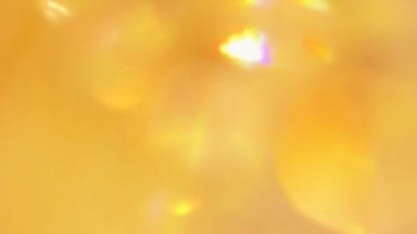 Bokeh sarı sızıntıları hareket ediyor. Çemberler hareket halinde bulanık.