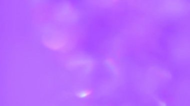 Bokeh pembe sızıntıları hareket ediyor. Çemberler hareket halinde bulanık.