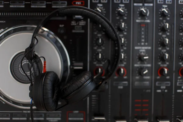 Musical DJ headphones with a mixer top view