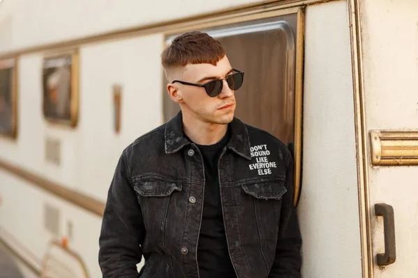 Fashion Handsome Young Guy Sunglasses Black Denim Jacket Vintage Trailer — Stock Photo, Image