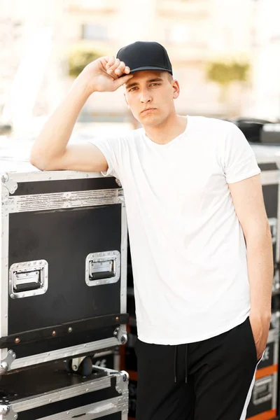 Stylish Young Model Man Black Cap White Shirt Standing Containers — Stock Photo, Image