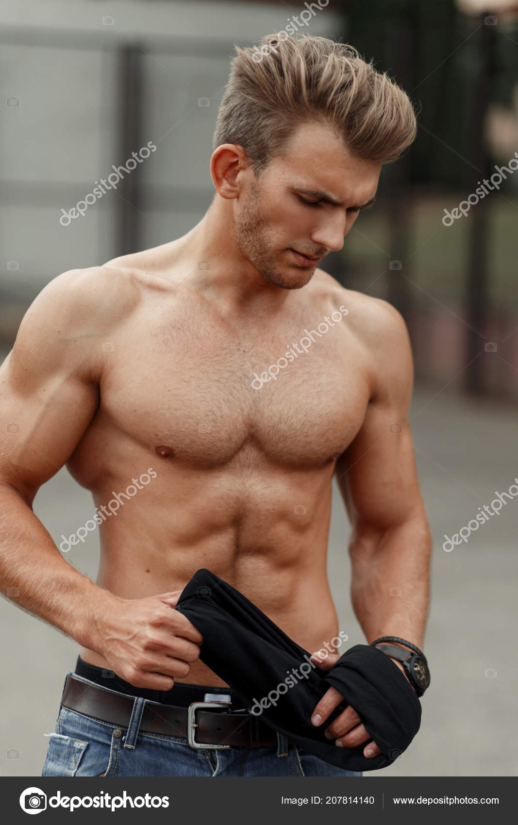 Handsome Man Or Muscular Macho Bodybuilder With Bristle Hairstyle Oily  Skin Sexy Muscle Torso Body With Triceps Biceps Poses On Grey  Background Stock Photo Picture And Royalty Free Image Image 96837664