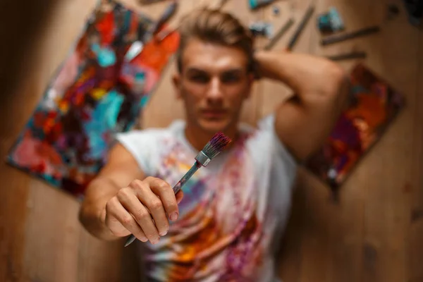 Handsome Young Man Artist Brush His Hand Set Tools Lies — Stock Photo, Image