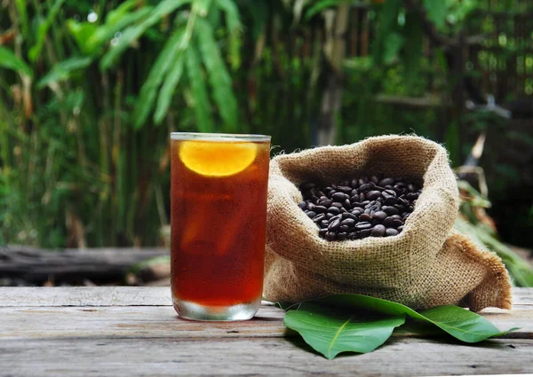 Coffee Dripping Ice Black Coffee Wood Table — Stock Photo, Image