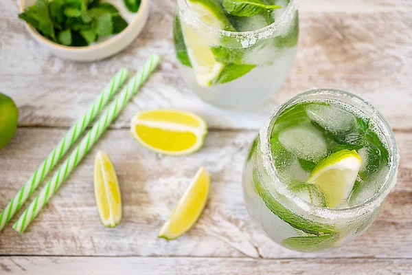 Ice Summer Lemonade Lime Mint Glasses Stands Light Wooden Table — Stock Photo, Image