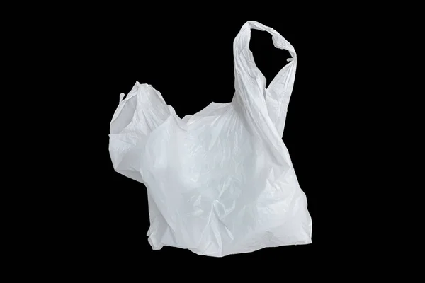 Siyah üzerine izole edilmiş beyaz plastik torba, siyah üzerine izole edilmiş beyaz plastik torba..