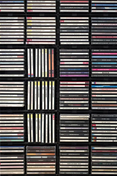 Close-up full frame view of a section of a large full shelf for a CD compact discs collection home library