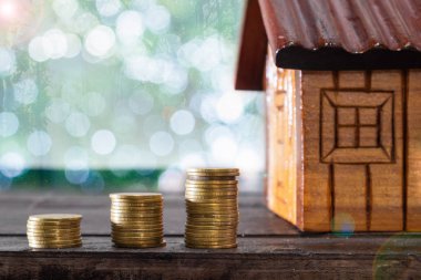 İş, bir ev satın almak için mali tasarruf kavramı büyüyen kaydetme para kavramı.