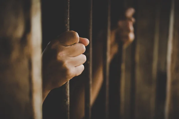 Prisoner Holding Metal Cage Jail Freedom Concept — Stock Photo, Image