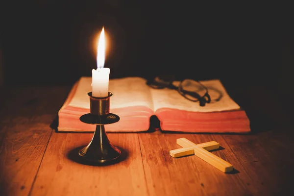 Cross Bible Candle Old Oak Wooden Table Beautiful Gold Background — Stock Photo, Image