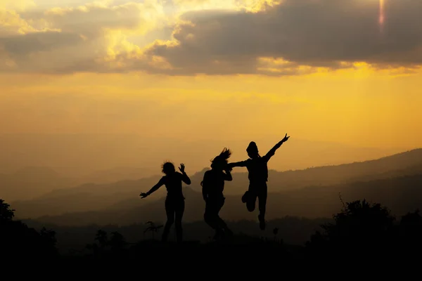 Group Happy People Jumping Mountain Sunset Concept Having Fun Hill — Stock Photo, Image