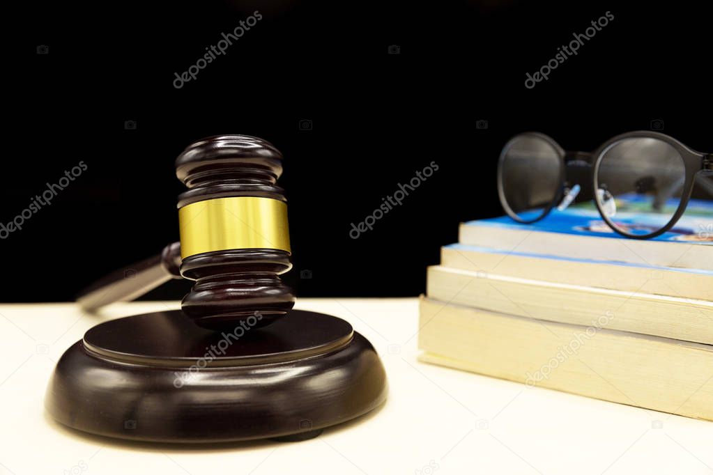 A law book with a gavel - Domestic violence law