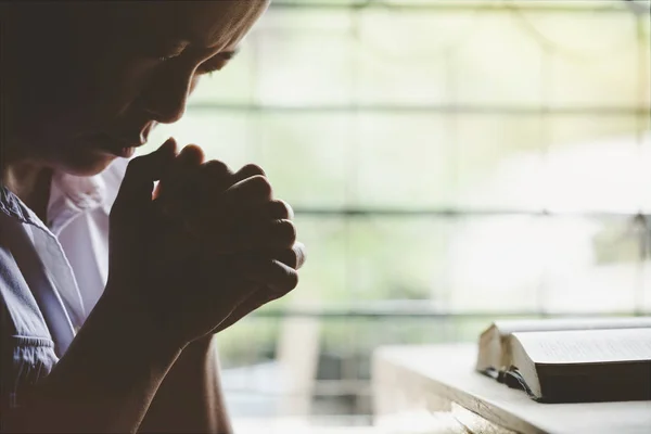Christian senior woman praying to God at home — Stock Photo, Image