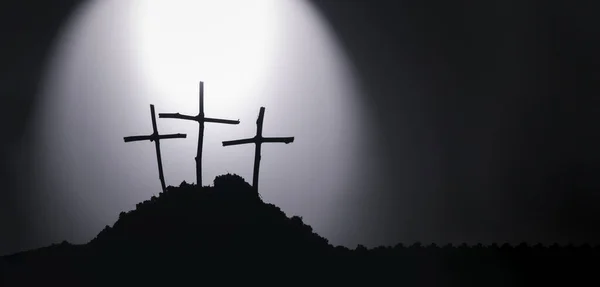 Jesus Christ cross religion symbol. Church Cross on a hill top in Silhouette. Black and white cross symbol for christian, resurrection and Jesus Christ.