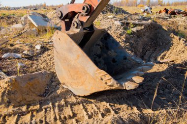 Kazı kovası zemin arkaplanına yakın çekim